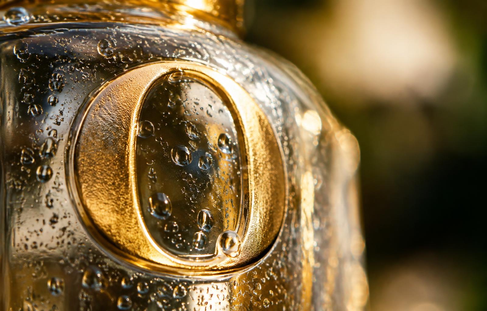 Macro of the embossed golden O logo